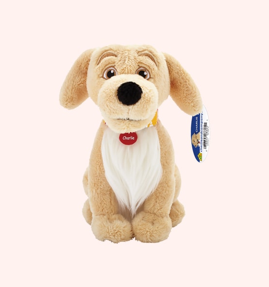 Plush tan dog toy with white chest