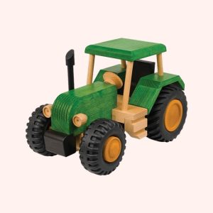 Green wooden toy tractor with black tires