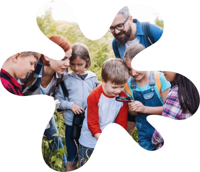 A family gardening together outdoors on a sunny day.