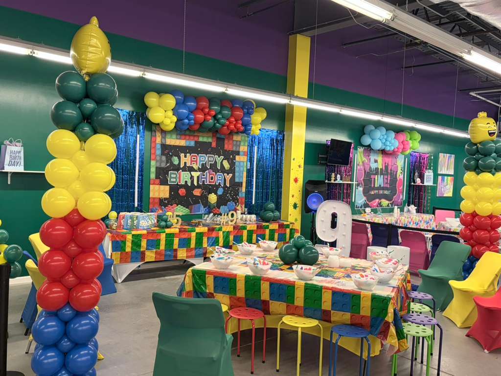 Colorful kids' birthday party room with balloons