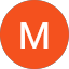 Orange circle with white letter M