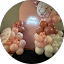 Pastel peach and white balloon arch